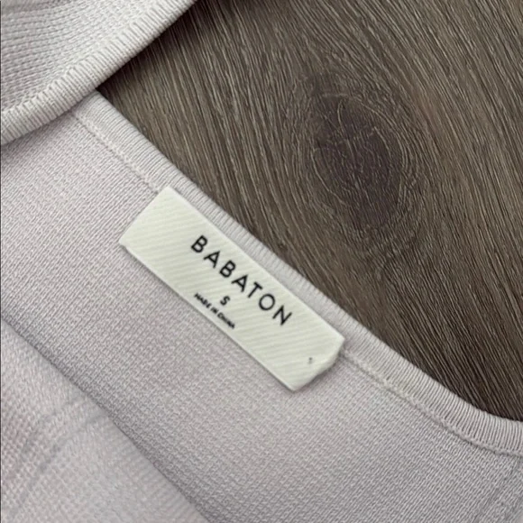 Elegant White Sleeveless Dress - Picture 2 of 3